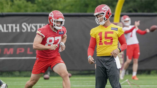 May 26, 2022; Kansas City, MO, USA; Kansas City Chiefs quarterback Patrick Mahomes (15) and tight end Travis Kelce (87) run drills during organized team activities at The University of Kansas Health System Training Complex.